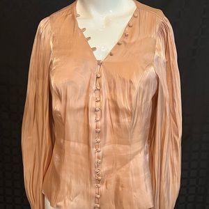 Tularosa top with beautiful statement sleeves.  Size M Nude/champagne in color.